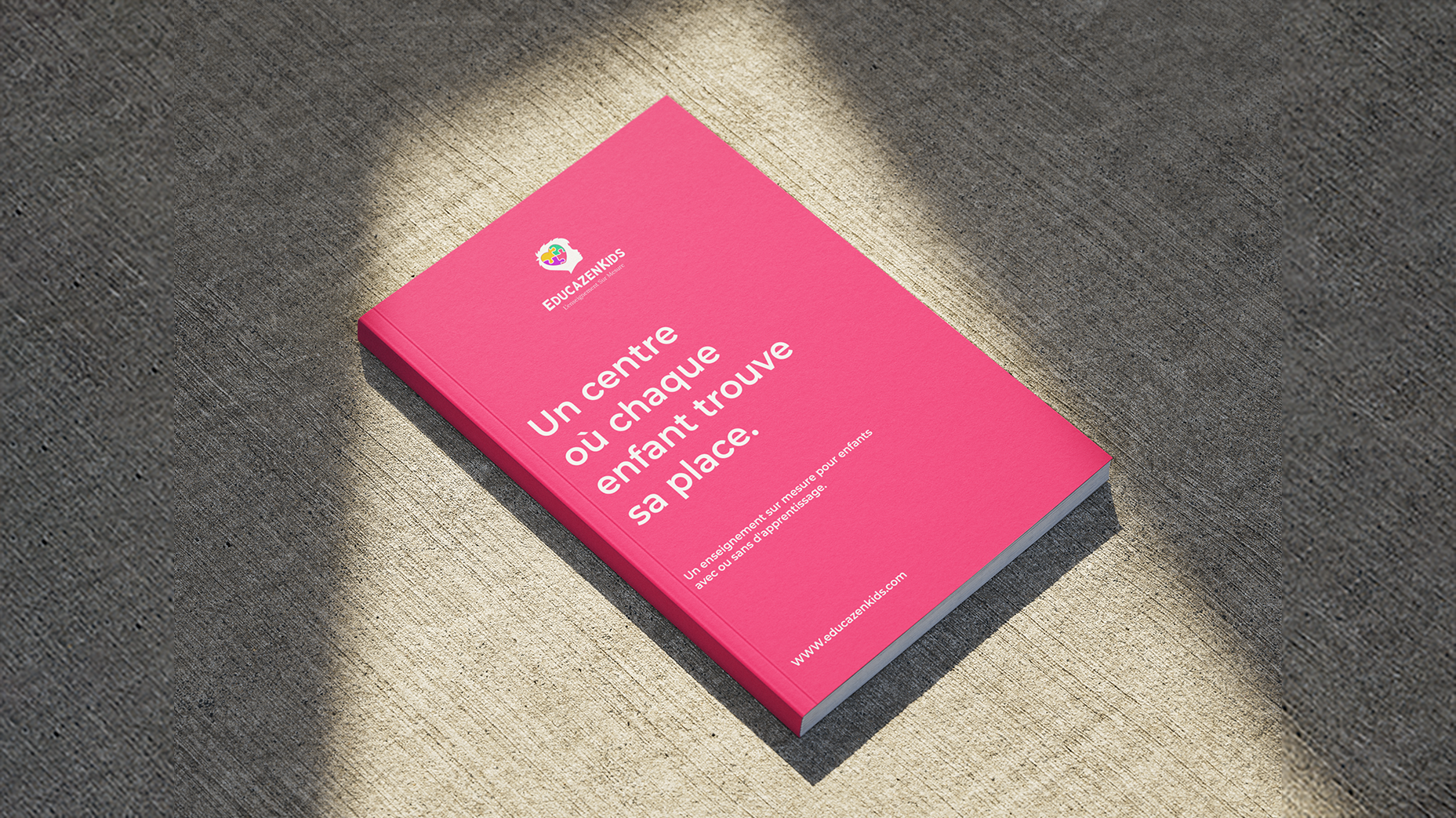 EducazenKids brand book mockup on textured surface